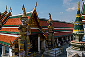 Bangkok Grand Palace, pair of statues of demons (yakshas) gatekeepers of the entrances in the western gallery of the Temple of the Emerald Buddha (Wat Phra Kaew).